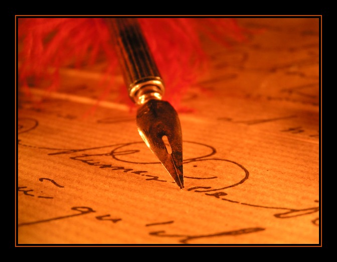 image of a fountain pen and elaborate cursive writing